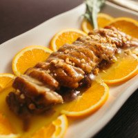 Pato con salsa de naranja
